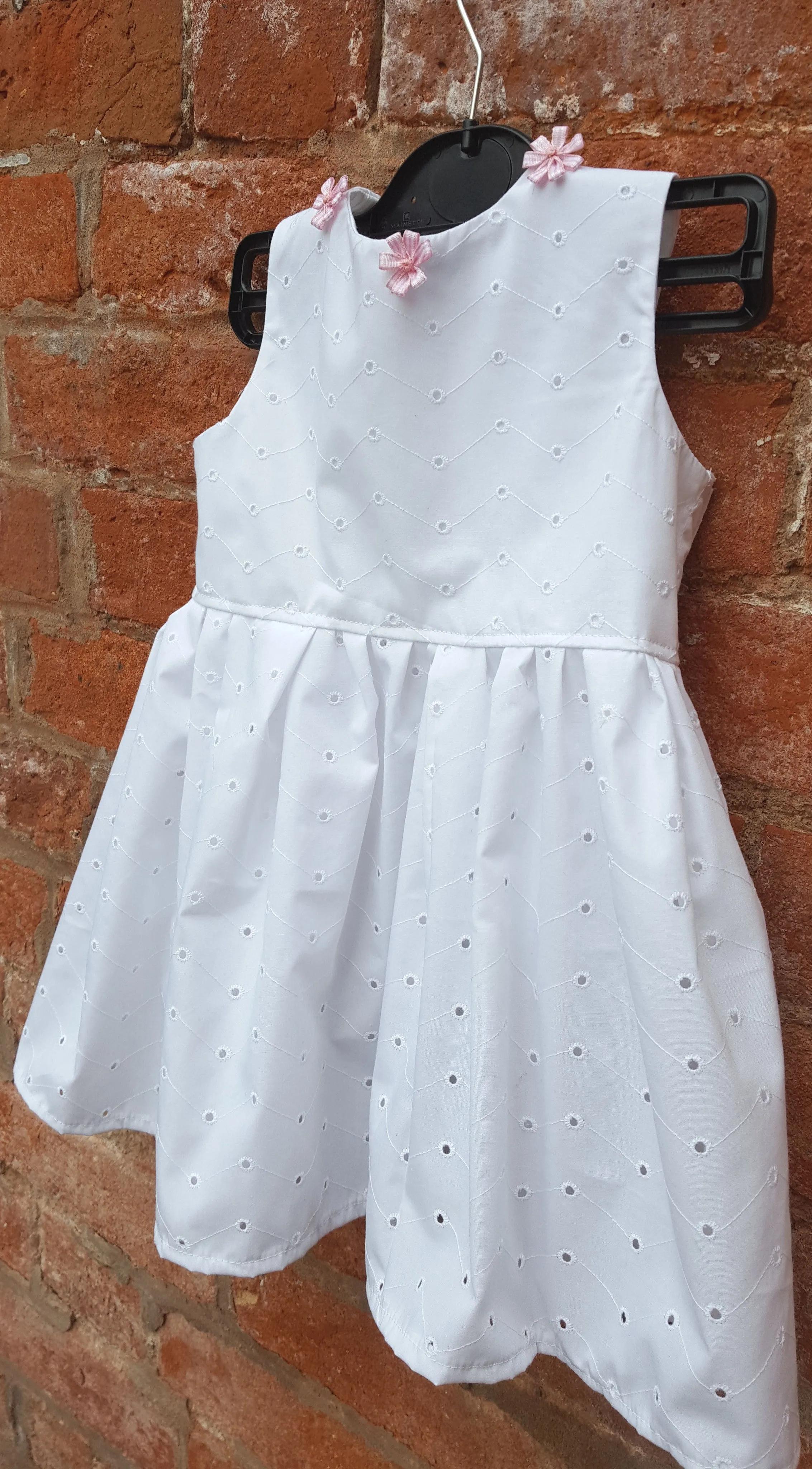 Toddler dress in white broderie anglaise to fit age 2 to 3